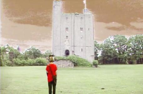 Knightmare Series 5 Team 4. Ben in a field with the gate tower in the distance.