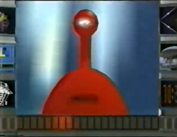 The Satellite Game - Big Tom the talking tomato, voiced by Colum Gallivan