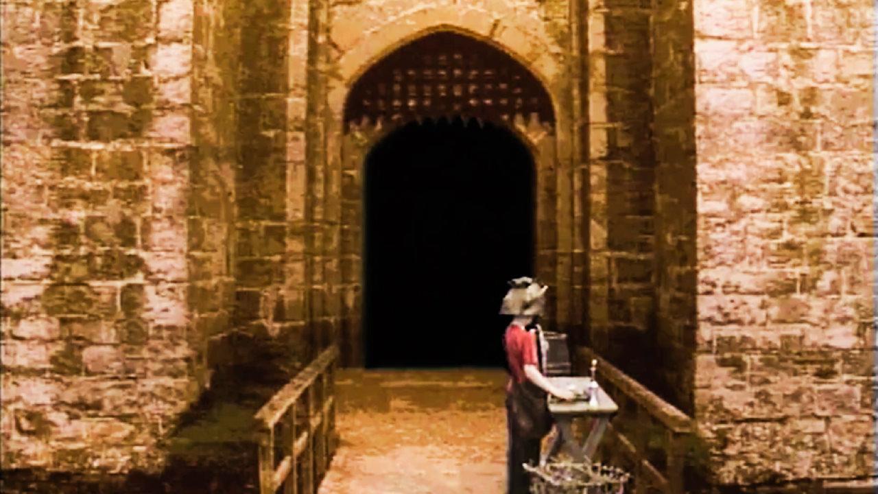 A dungeoneer at the Castle Entrance (Bodiam Castle) used in Series 5 (1991).