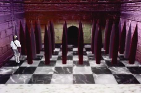 Knightmare Series 7 Team 2. Nicola on a chess board covered by spikes.
