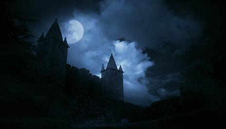 A photographic of a castle at night