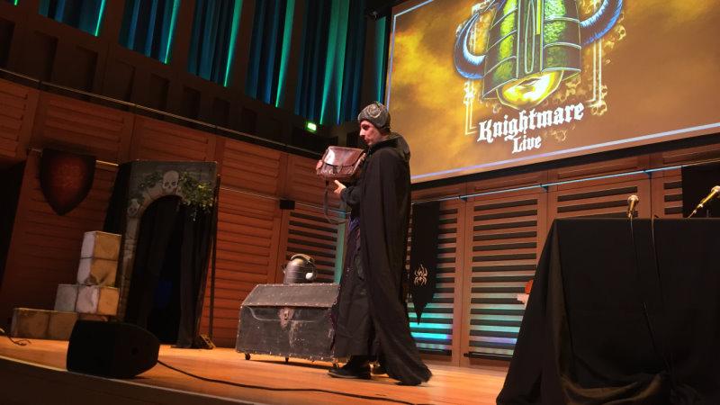 Lord Fear demonstrates the knapsack at Knightmare Live, Kings Place 2021.