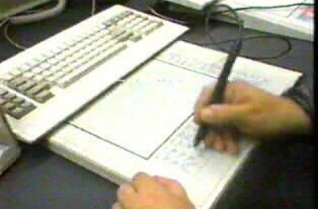Robert Harris uses a tablet to edit rooms behind the scenes on Knightmare.