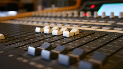 Audio mixing desk. Photo by Wim Coenen for FreeImages.