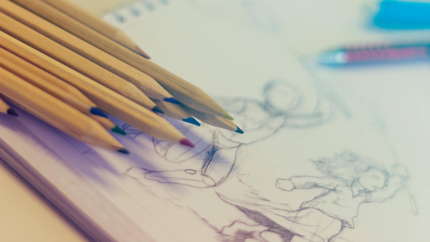 Coloured pencil set and partially completed drawing.
Photo by Javier Gonzalez from Pexels.
