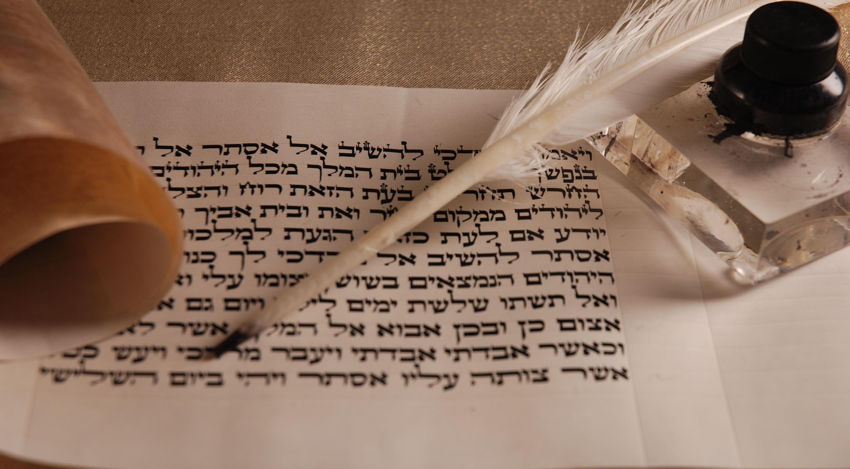 Scroll with ink and quill