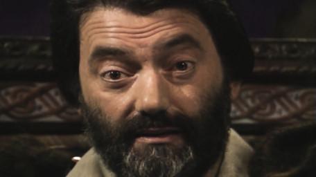 Treguard the Dungeon Master, played by Hugo Myatt. As seen in Series 4 of Knightmare (1990).