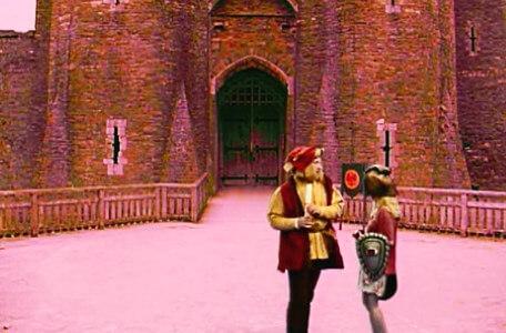 Knightmare Series 6 Team 4. January trades with Julius Scaramonger in a castle courtyard.