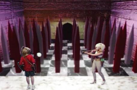 Knightmare Series 7 Team 3. Romahna points her crossbow at Alex at the Trial by Spikes.